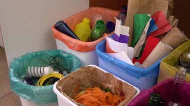 Home waste sorting system. Separate garbage collection. Household boxes for plastic paper glass metal organic waste