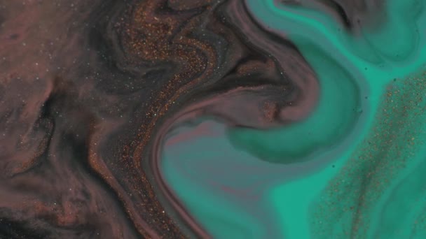 Teal menthe turquoise et peinture liquide marron avec des particules brillantes fond mélangé. Macro shot — Video