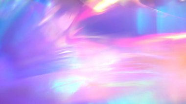 Holografik gökkuşağı tek boynuzlu at pastel pembe maviye benzer soyut arkaplan renkleri. Optik kristal prizma ışınlar. Fişekler. Noel dokusu