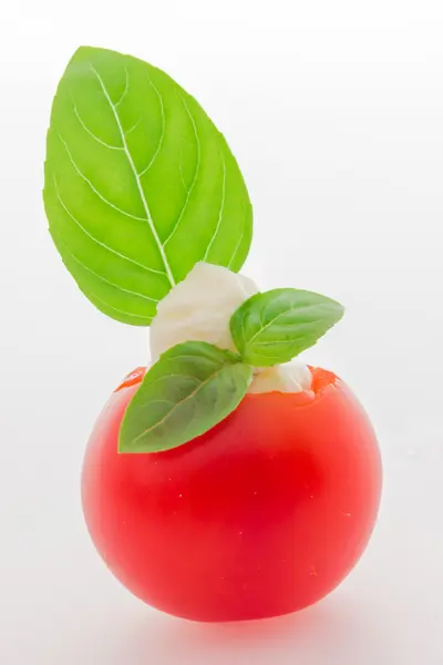 Cherry tomatoes with soft cheese — Stock Photo, Image