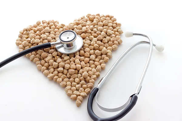 Garbanzos biológicos. Forma de tierra — Foto de Stock