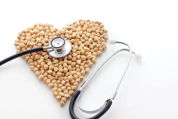 Garbanzos biológicos. Forma de tierra — Foto de Stock