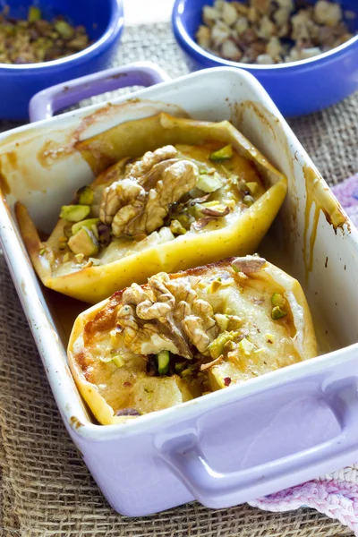 Baked apple with honey and pistachio nuts — Stock Photo, Image