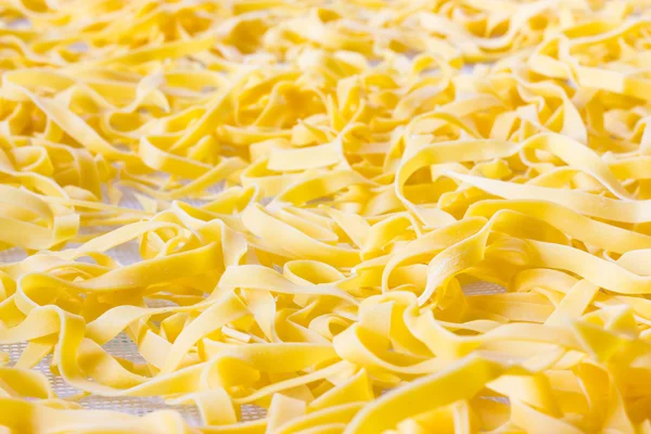 Drying real tagliatelle Emiliane — Stock Photo, Image