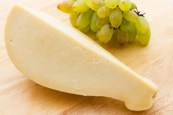 Skiva scamorza ost från Italien — Stockfoto