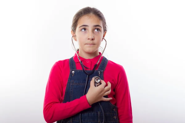 Petite fille avec stéthoscope — Photo