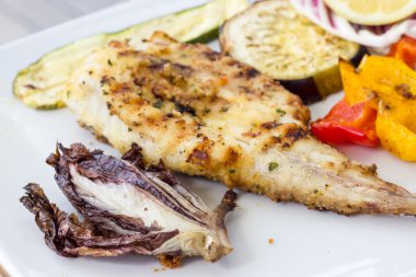 Grilled turbot with grilled vegetables clipart
