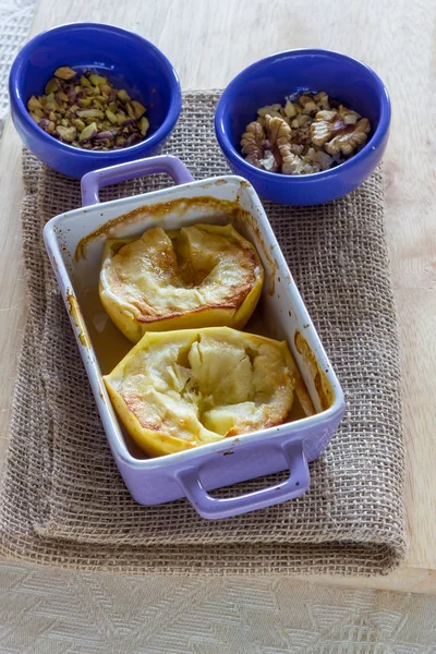 Baked apple with honey and pistachio nuts — Stock Photo, Image