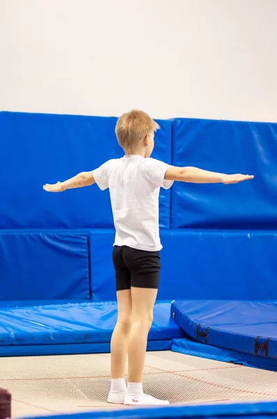 Orenburg, Russia - 30 April 2016: The boys compete in jumping on the trampoline — Stock Photo, Image