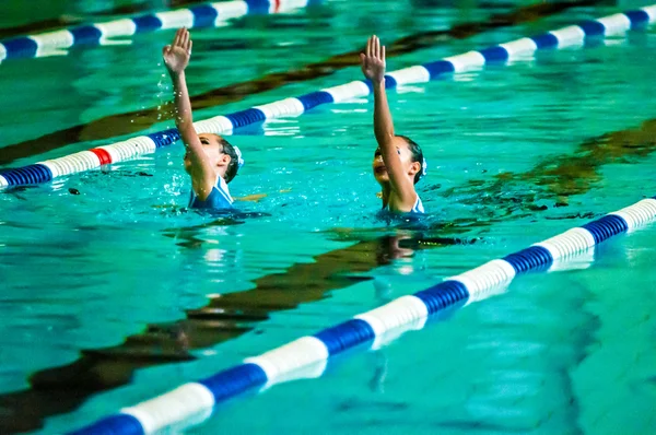 Female synchronized swimming — Stock Photo, Image