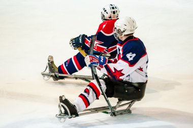Game in ice sledge hockey clipart
