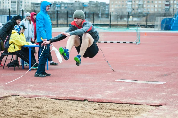 Men compete in long jump, Orenburg, Russia — Stock Photo, Image