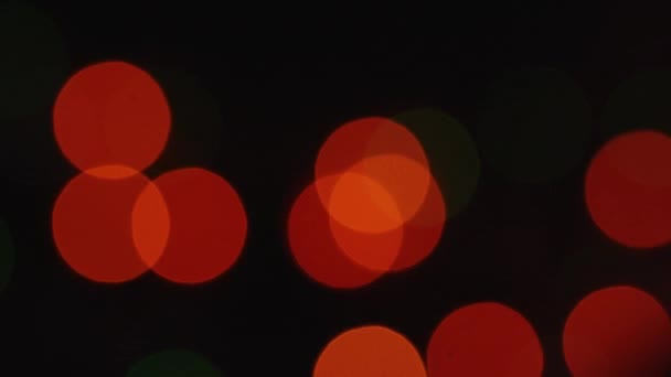 Wazig saaie glinsterende kerstverlichting bokeh achtergrond van flikkerende lichten — Stockvideo