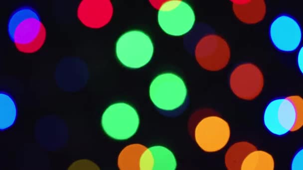 Heldere veelkleurige glinsterende lichten Diepe bokeh abstracte achtergrond in wazig — Stockvideo