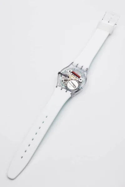 Paris, France 07.10.2020 - Swatch quartz watch open electronic mechanism Royalty Free Stock Images