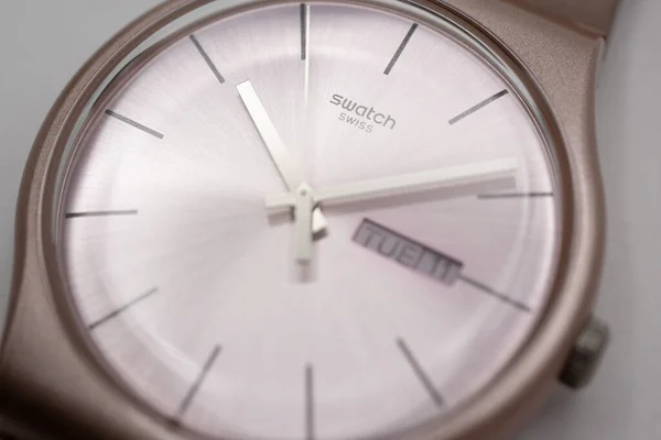 Geneve, Switzerland 07.10.2020 - Swatch swiss logo on beige wristwatch dial — 스톡 사진