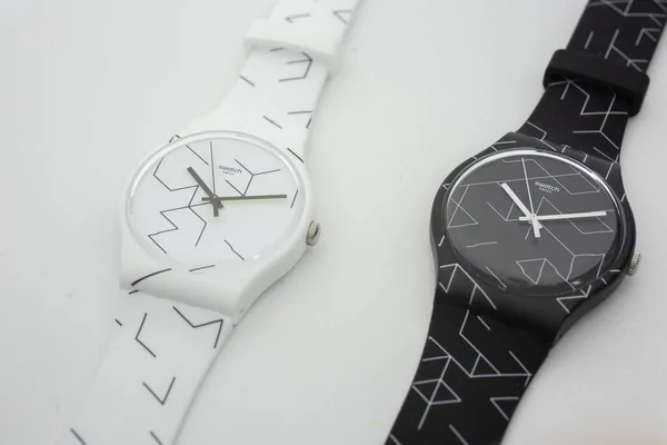 London, GB 07.10.2020 - 2 Swatch swiss made quartz watch Black white design — 스톡 사진
