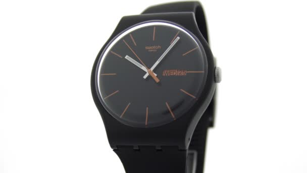 London, UK, 01.11.2020 Swatch black plastic watch ticking isolated — 비디오