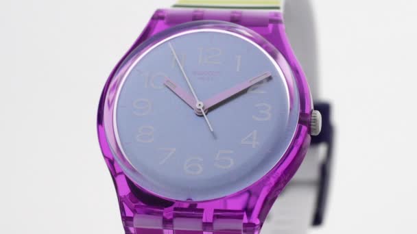 London, UK, 01.11.2020 Swatch fashion plastic watch ticking isolated — стокове відео