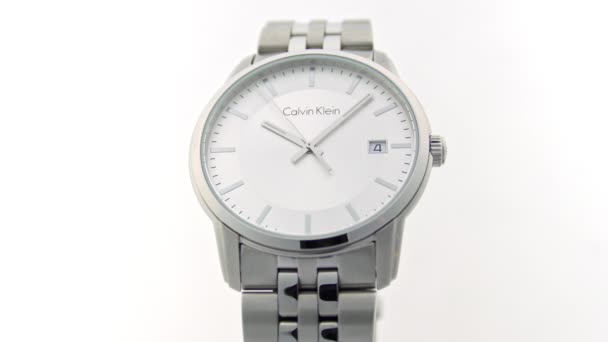 London, UK, 01.11.2020: Calvin Klein fashion watch ticking isolated on white — стокове відео
