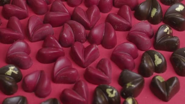 Delicious handmade chocolates shape of heart. Valentines Day heart-shape Candy — Stock Video