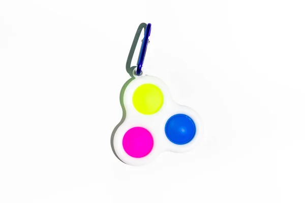 Einfache Dimple Fidget Spielzeug, bunte Anti-Stress-Spiel isoliert auf weißem Hintergrund — Stockfoto