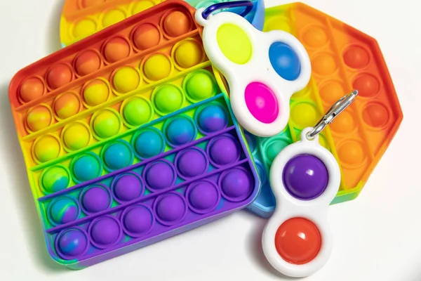 Pop It Simple Dimple - sensorial anti-estrés Fidget juguetes aislados fondo blanco Imagen De Stock