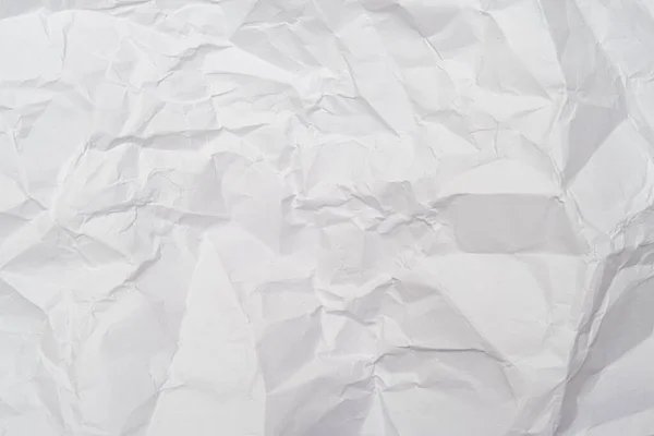 A háttér fehér gyűrött papír ráncok, háttér a tervezés és a web — Stock Fotó