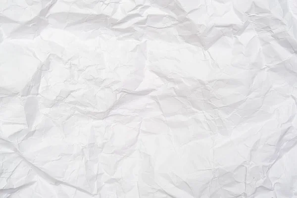 Un fond de feuille de papier froissé blanc avec des rides, toile de fond pour le design et la toile — Photo