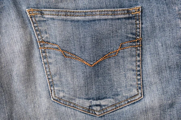 Modré ošuntělé džíny zadní kapsy zavřít — Stock fotografie