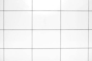 Banyonun duvarında ya da zemininde beyaz seramik fayansların soyut bir arkaplanı