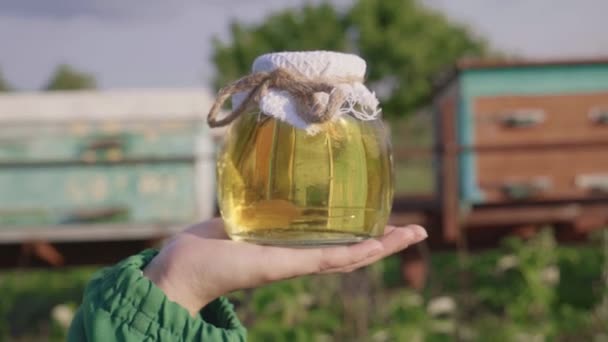 Beekeeper Honey Woman Farmer Shows Honey Her Apiary Yellow Honey — Stock Video