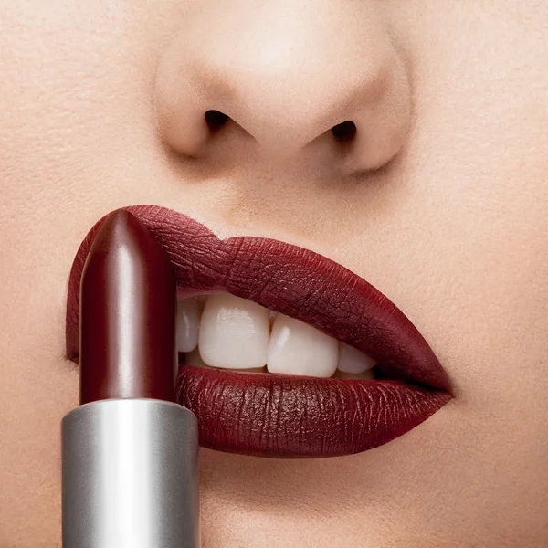 Red lipstick getting applyed on lips — Stock Photo, Image