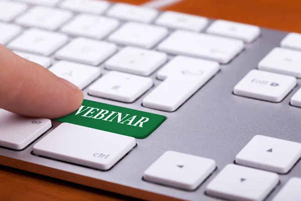 Botão verde no teclado com palavra webinar nele — Fotografia de Stock