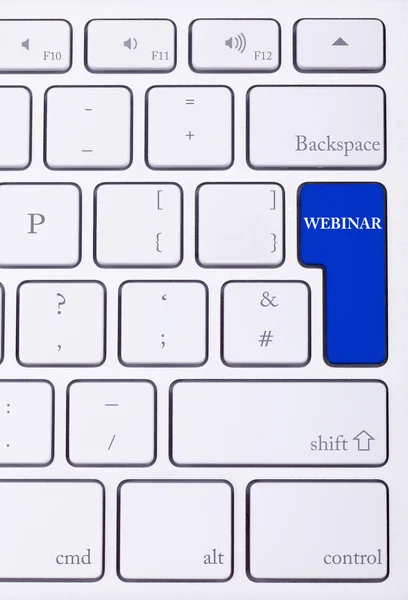 Keyboard with webinar text on blue button — Stock Photo, Image