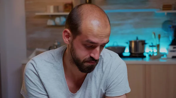 Stressed man working overtime feels eye fatigue — Stock Photo, Image