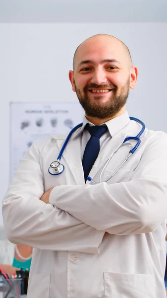 Portrait of young man doctor smiled at camera — Stok Foto