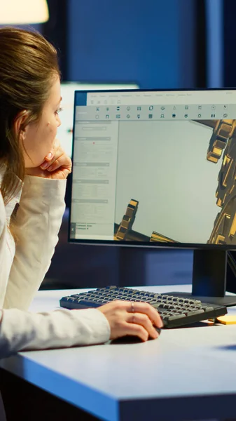 Tired woman architect working on modern cad program overtime