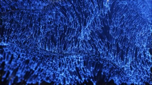 Abstract fosforiserend blauw behang dat langzaam zwaait — Stockvideo