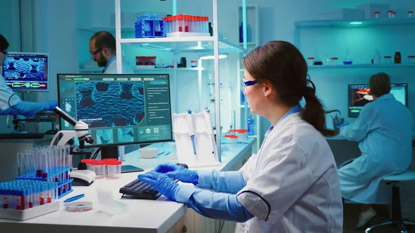 Overworked chemist looking tired at camera —  Fotos de Stock