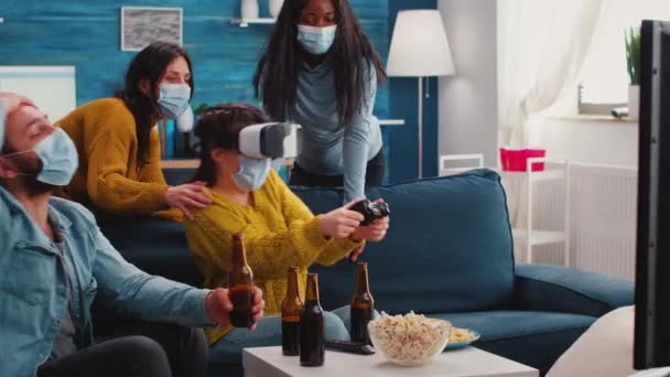 Multiethnic friends having fun playing video game with vr headset — Stock Video