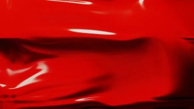Kırmızı renk boya ya da tekstil kumaş dikişsiz döngü arkaplanı yavaş hareket ediyor