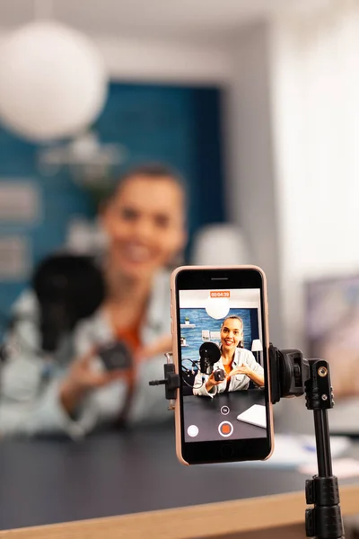 Close up of video blogger recording giveaway video for subscribers — Stock Photo, Image