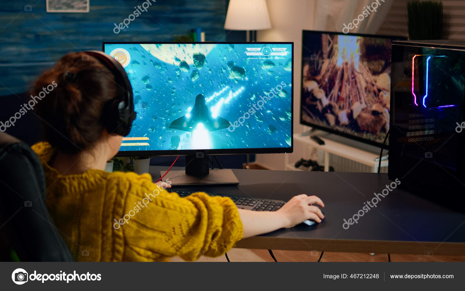 Free Photo  Person playing video games with controller on computer. player  using joystick and wearing headphones to play online game on monitor.  modern man using gaming equipment to have fun.