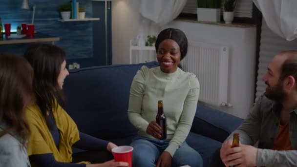 Woman with black skin gathering late at night with friends in living room — Stock Video