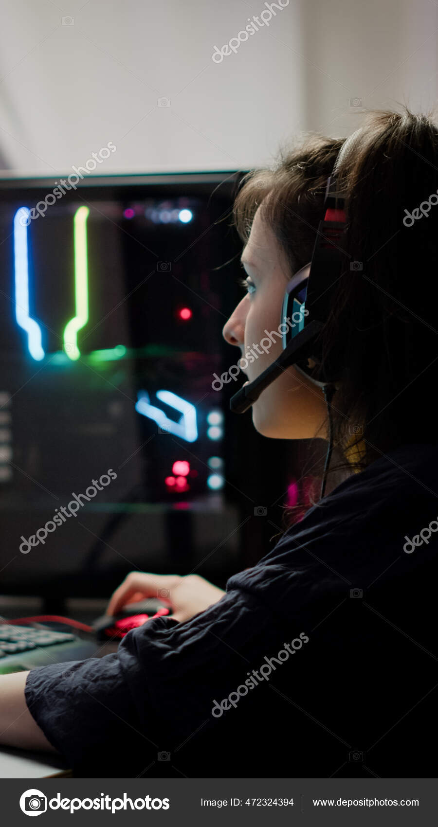 Free Photo  Person playing video games with controller on computer. player  using joystick and wearing headphones to play online game on monitor.  modern man using gaming equipment to have fun.