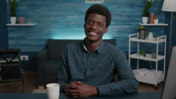 Portrait of handsome african american man looking into camera — Stock Video