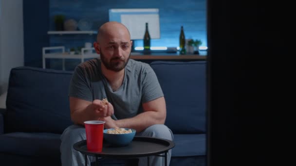 Bachelor man enjoying weekend resting lean sitting on comfy sofa — Stock Video