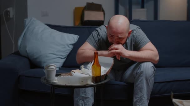 Breakdown depressed worried hopeless man with tears sitting on couch — Stock Video