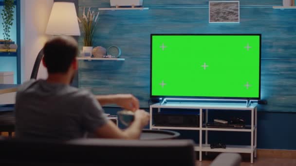 Person watching sport event or football on green screen — Stock Video